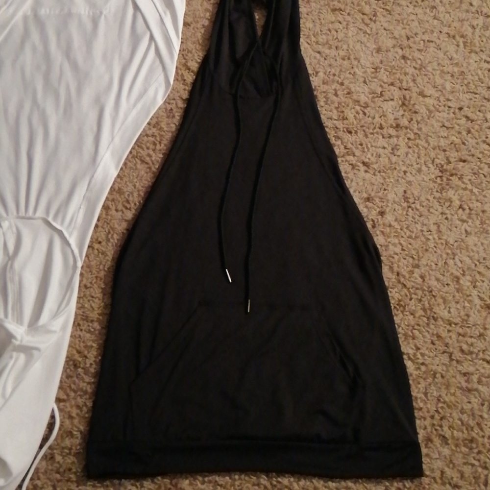 Two Hooded Back Out Tops with drawstring. Both $12